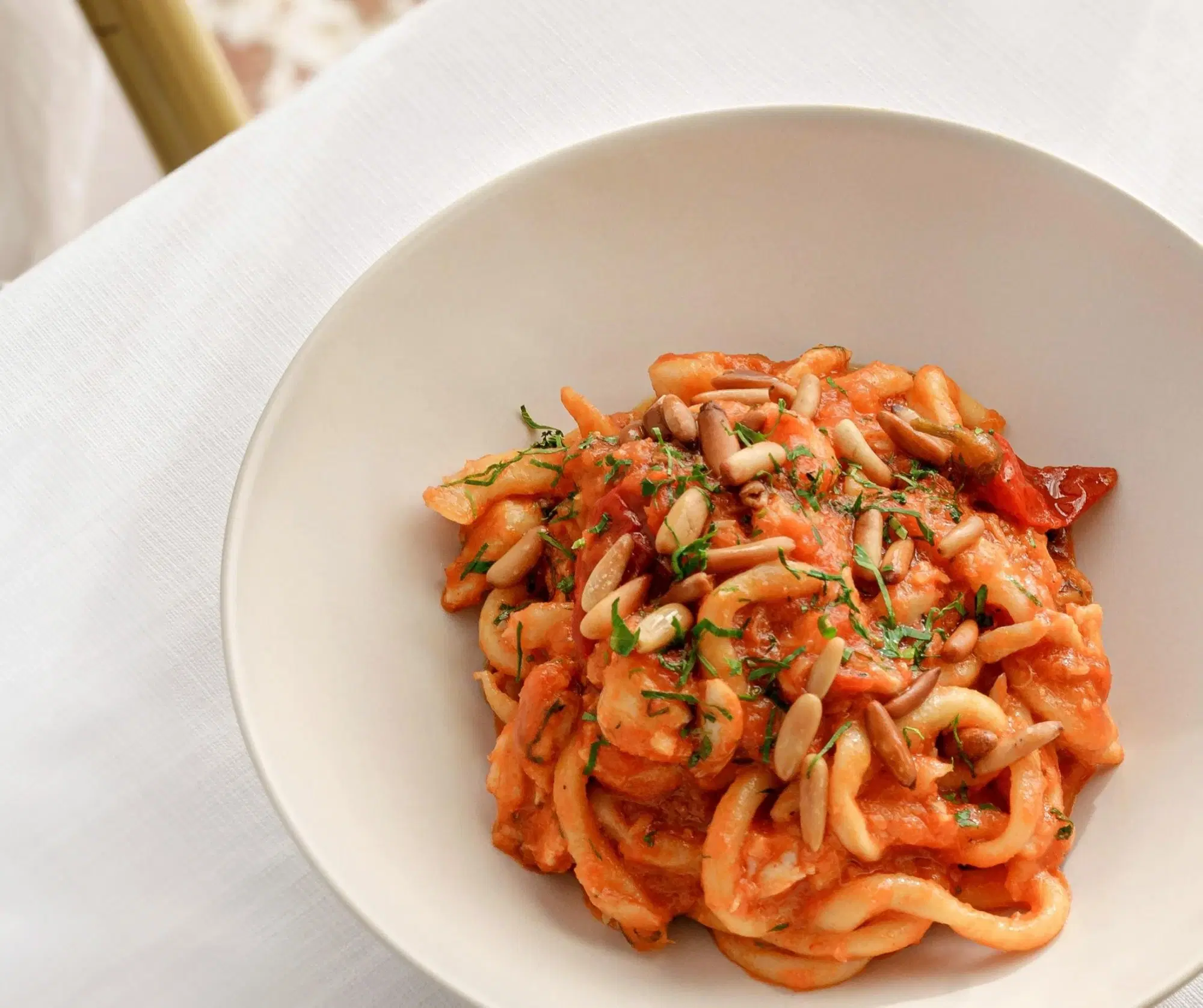 This Italian 'Pici Crab and Pomodoro Pasta' recipe will be a hit with the whole family