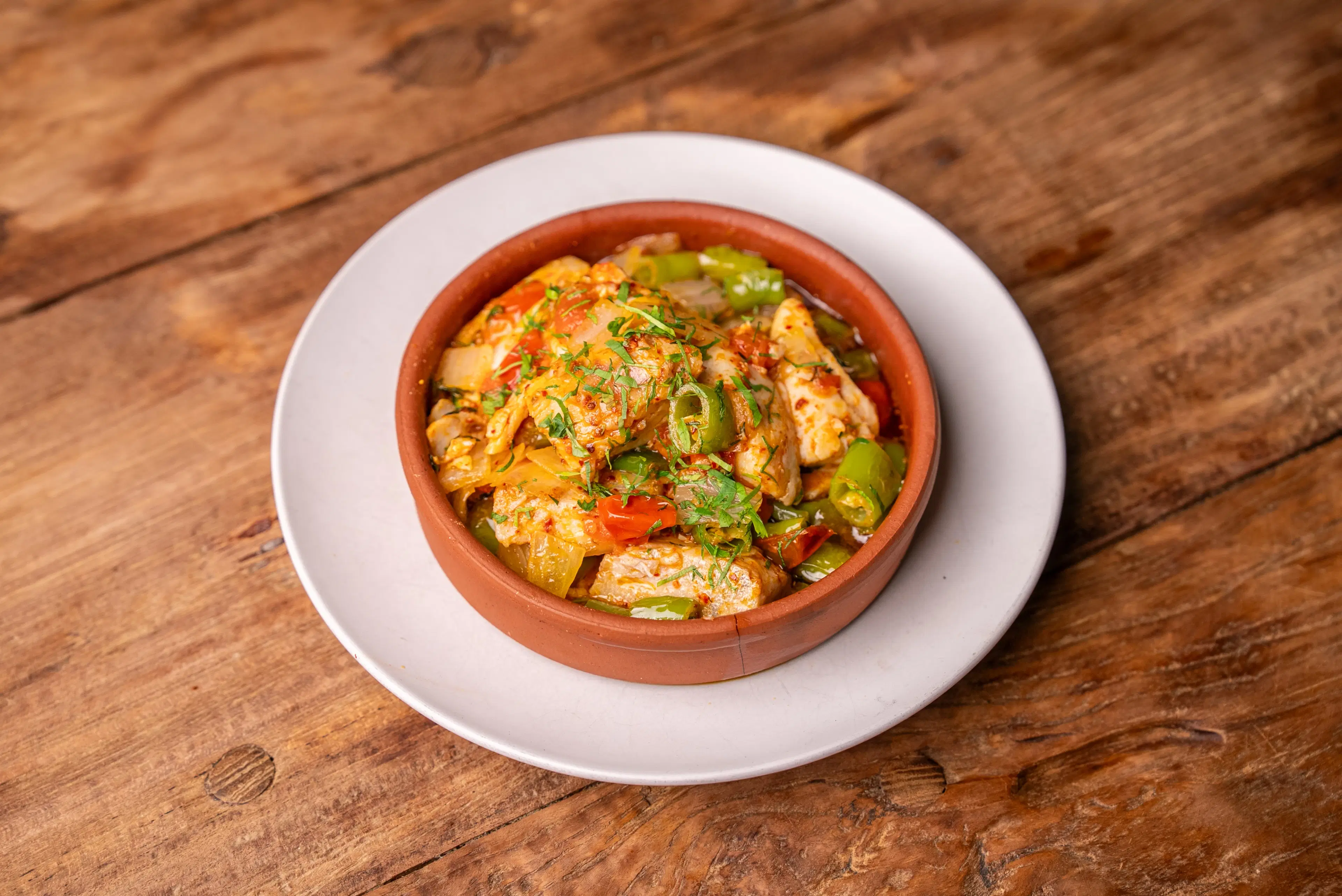 Bring a taste of the Turkish coast to your table with Bordo Mavi’s signature Fish Kavurma
